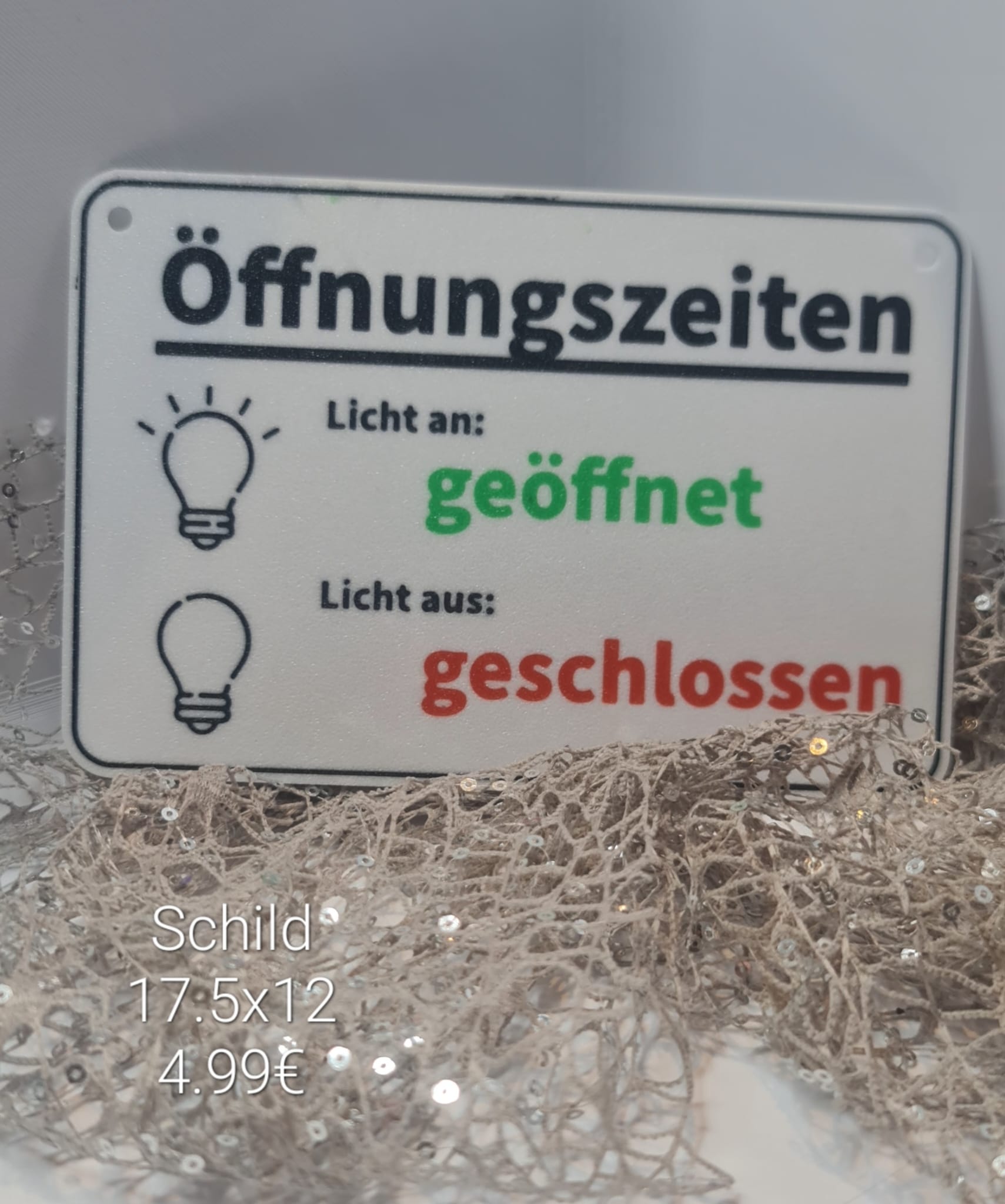 Schild Öffnungszeiten